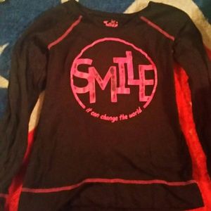 A long sleeve black Justice shirt